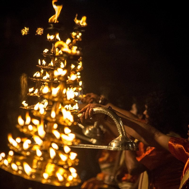 Multi-tiered 108-wick brass deepam lit with pure camphor for Varanasi Ganga Aarti